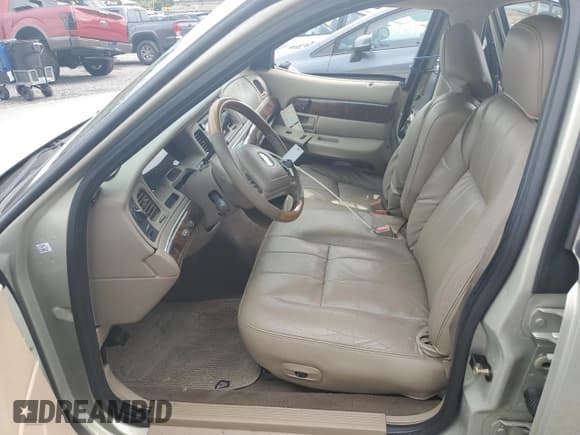 ✅ 2004 Mercury Grand Marquis LS Premium • VIN: 2MEFM75W34X681412 • Lot: 69825083. Listed on Copart with 88,003 mi. Free auction sales archive from the USA and detailed vehicle history report at DreamBid. Image 7.