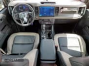 ✅ 2024 Ford Bronco Wildtrak • VIN: 1FMEE2BP4RLB23952 • Lot: 61547765. Listed on Copart with 12,180 mi. Free auction sales archive from the USA and detailed vehicle history report at DreamBid. Image 8.