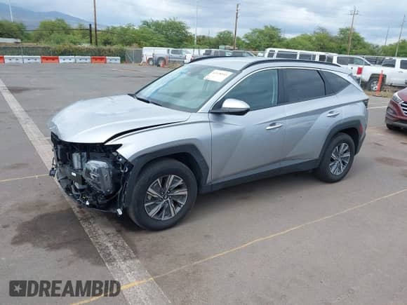 2023 Hyundai Tucson Blue z VIN KM8JBCA16PU097422, wystawiony jako IAAI lot #42138545 z przebiegiem 14 826 mil mil oraz . Historia ofert i sprzedaży dostępna na DreamBid. Obrazek 2.