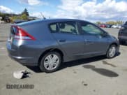 ✅ 2014 Honda Insight • VIN: JHMZE2H3XES000889 • Lot: 84641315. Listed on Copart with 84,590 mi. Free auction sales archive from the USA and detailed vehicle history report at DreamBid. Image 3.