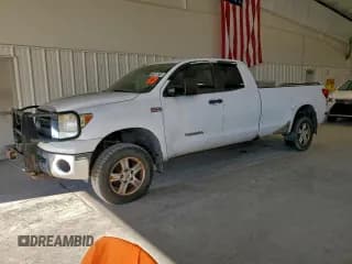✅ 2010 Toyota Tundra • VIN: 5TFCW5F19AX010477 • Lot: 96317585. Listed on Copart with 404,447 mi. Free auction sales archive from the USA and detailed vehicle history report at DreamBid. Image 1.