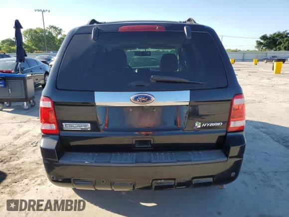 ✅ 2011 Ford Escape Hybrid • VIN: 1FMCU4K3XBKB84401 • Lot: 56491315. Wystawiony na Copart z przebiegiem 108 757 mil. Bezpłatny archiwum sprzedaży aukcyjnych z USA i szczegółowy raport historii pojazdu na DreamBid. Zdjęcie 6.