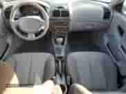 2005 Hyundai Accent GLS z VIN KMHCG45C35U595666, wystawiony jako Copart lot #88294365 z przebiegiem 70 497 mil mil oraz Szkoda całkowita • Salvage title. Historia ofert i sprzedaży dostępna na DreamBid. Obrazek 8.