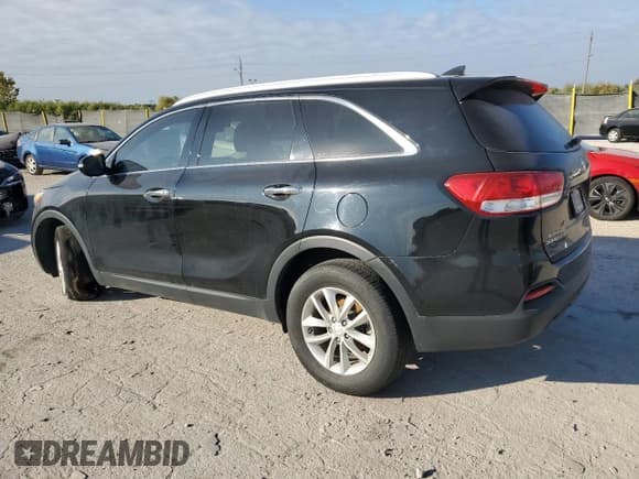 ✅ 2017 Kia Sorento L • VIN: 5XYPG4A31HG299840 • Lot: 86898005. Listed on Copart with 88,923 mi. Free auction sales archive from the USA and detailed vehicle history report at DreamBid. Image 2.