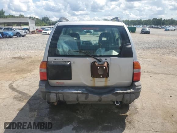 ✅ 2004 Suzuki Grand Vitara • VIN: 2S3TE62V646102332 • Lot: 68309535. Wystawiony na Copart z przebiegiem 248 542 mil. Bezpłatny archiwum sprzedaży aukcyjnych z USA i szczegółowy raport historii pojazdu na DreamBid. Zdjęcie 6.