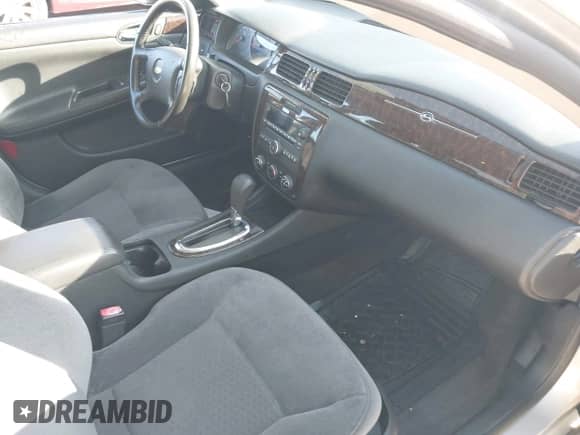 2013 Chevrolet Impala LS z VIN 2G1WA5E37D1163268, wystawiony jako IAAI lot #43618879 z przebiegiem 146 875 mil mil oraz . Historia ofert i sprzedaży dostępna na DreamBid. Obrazek 5.