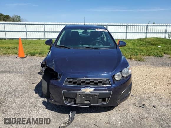 2016 Chevrolet Sonic LT z VIN 1G1JC5SH9G4158053, wystawiony jako Copart lot #69620014 z przebiegiem 87 671 mil mil oraz Czysty tytuł • Clean title. Historia ofert i sprzedaży dostępna na DreamBid. Obrazek 5.