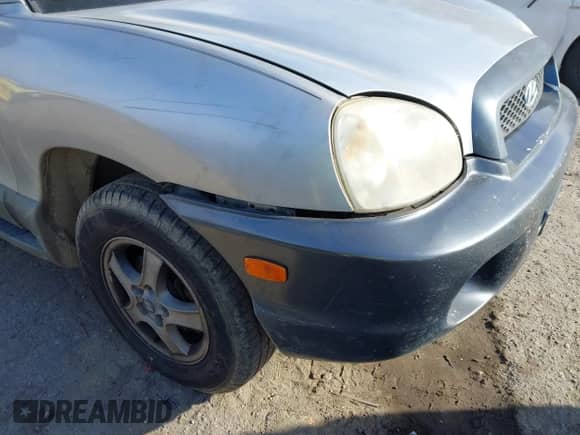 2004 Hyundai Santa Fe GLS z VIN KM8SC13EX4U799955, wystawiony jako IAAI lot #41240442 z przebiegiem 281 394 mil mil oraz . Historia ofert i sprzedaży dostępna na DreamBid. Obrazek 6.