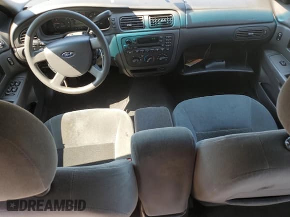 ✅ 2005 Ford Taurus SE • VIN: 1FAFP53U05A259841 • Lot: 57255835. Listed on Copart with 179,821 mi. Free auction sales archive from the USA and detailed vehicle history report at DreamBid. Image 8.