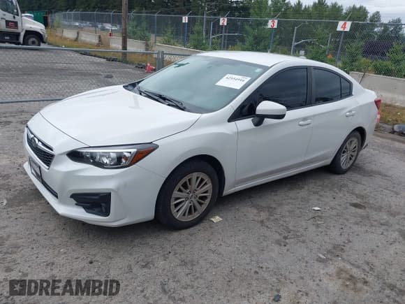 ✅ 2018 Subaru Impreza Premium • VIN: 4S3GKAD69J3622819 • Lot: 42934916. Listed on IAAI with 100,827 mi. Free auction sales archive from the USA and detailed vehicle history report at DreamBid. Image 2.