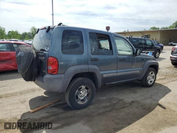 ✅ 2002 Jeep Liberty Sport • VIN: 1J4GL48K92W279784 • Lot: 61401695. Listed on Copart with 173,223 mi. Free auction sales archive from the USA and detailed vehicle history report at DreamBid. Image 3.