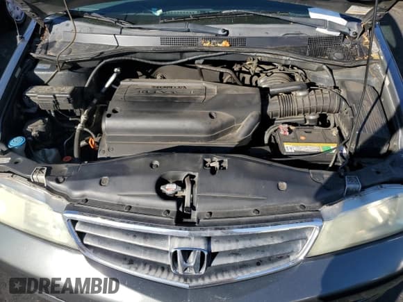 ✅ 2004 Honda Odyssey EX-L • VIN: 5FNRL18024B038538 • Лот: 80870125. Опубликован ранее на Copart с пробегом 274 989 миль. Бесплатный доступ к архиву аукционных продаж из США и подробный отчёт об истории автомобиля на DreamBid. Изображение 11.