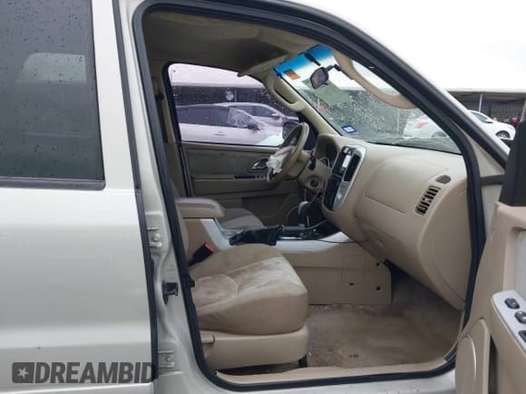 ✅ 2007 Mercury Mariner Convenience • VIN: 4M2YU80Z17KJ08849 • Lot: 41525410. Listed on IAAI with 227,293 mi. Free auction sales archive from the USA and detailed vehicle history report at DreamBid. Image 5.