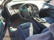 ✅ 1997 Ford Thunderbird LX • VIN: 1FALP62W2VH171912 • Lot: 65073454. Wystawiony na Copart z przebiegiem 179 439 mil. Bezpłatny archiwum sprzedaży aukcyjnych z USA i szczegółowy raport historii pojazdu na DreamBid. Zdjęcie 8.