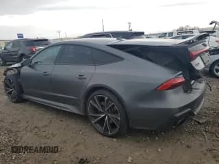 ✅ 2021 Audi RS 7 • VIN: WUAPCBF29MN906721 • Lot: 84500694. Wystawiony na Copart z przebiegiem 31 260 mil. Bezpłatny archiwum sprzedaży aukcyjnych z USA i szczegółowy raport historii pojazdu na DreamBid. Zdjęcie 2.