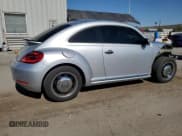 ✅ 2015 Volkswagen Beetle Fleet Edition • VIN: 3VWF17AT4FM600788 • Lot: 63053865. Listed on Copart with 72,547 mi. Free auction sales archive from the USA and detailed vehicle history report at DreamBid. Image 3.