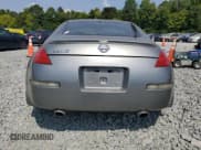 ✅ 2005 Nissan 350Z • VIN: JN1AZ34D85M608232 • Лот: 69145384. Опубликован ранее на Copart с пробегом 128 199 миль. Бесплатный доступ к архиву аукционных продаж из США и подробный отчёт об истории автомобиля на DreamBid. Изображение 6.