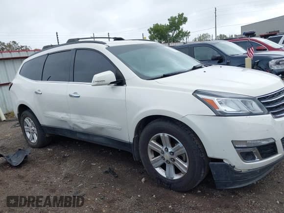 ✅ 2014 Chevrolet Traverse LT • VIN: 1GNKRHKD4EJ347949 • Lot: 43276112. Listed on IAAI with 288,050 mi. Free auction sales archive from the USA and detailed vehicle history report at DreamBid. Image 13.