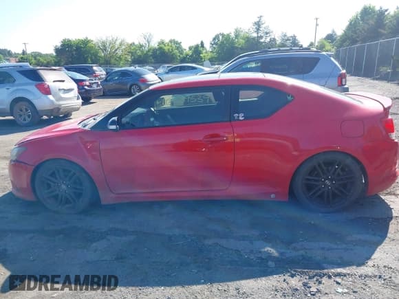 ✅ 2013 Scion tC • VIN: JTKJF5C74D3052639 • Lot: 42539539. Wystawiony na IAAI z przebiegiem 109 405 mil. Bezpłatny archiwum sprzedaży aukcyjnych z USA i szczegółowy raport historii pojazdu na DreamBid. Zdjęcie 14.