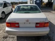 ✅ 1998 Lexus LS 400 • VIN: JT8BH28F5W0110488 • Лот: 78726824. Опубликован ранее на Copart с пробегом Не указан. Бесплатный доступ к архиву аукционных продаж из США и подробный отчёт об истории автомобиля на DreamBid. Изображение 6.