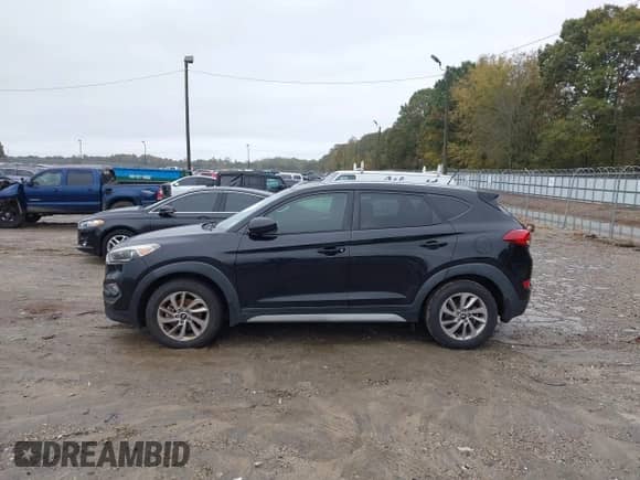 2017 Hyundai Tucson SE z VIN KM8J33A42HU585775, wystawiony jako IAAI lot #43521465 z przebiegiem 125 000 mil mil oraz . Historia ofert i sprzedaży dostępna na DreamBid. Obrazek 14.