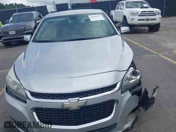2016 Chevrolet Malibu LT z VIN 1G11C5SA5GF156985, wystawiony jako IAAI lot #42944353 z przebiegiem 159 538 mil mil oraz . Historia ofert i sprzedaży dostępna na DreamBid. Obrazek 12.