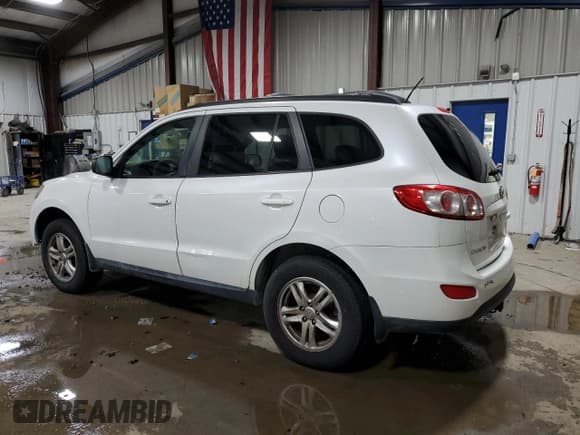 ✅ 2012 Hyundai Santa Fe GLS • VIN: 5XYZGDAB7CG123495 • Lot: 81838804. Listed on Copart with 145,621 mi. Free auction sales archive from the USA and detailed vehicle history report at DreamBid. Image 2.