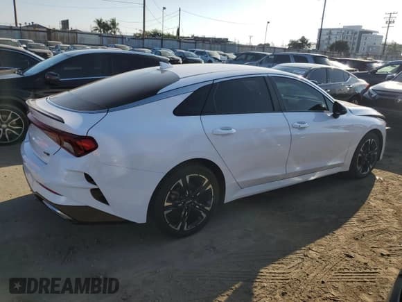 ✅ 2022 Kia K5 GT-Line • VIN: 5XXG64J23NG124919 • Лот: 84924835. Опубликован ранее на Copart с пробегом 48 611 миль. Бесплатный доступ к архиву аукционных продаж из США и подробный отчёт об истории автомобиля на DreamBid. Изображение 3.