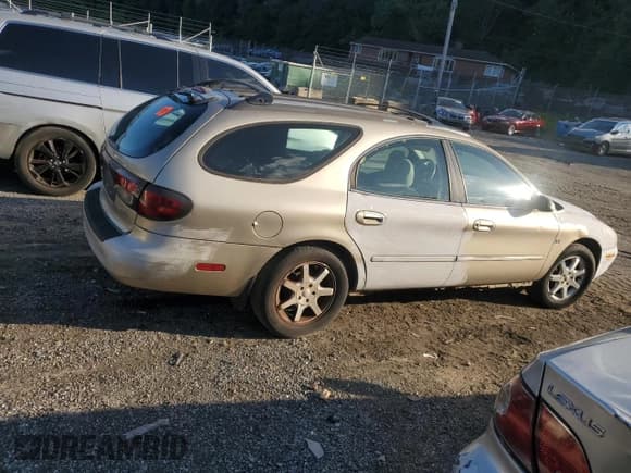 ✅ 2000 Mercury Sable LS Premium • VIN: 1MEFM59S5YG621395 • Lot: 71601435. Listed on Copart with 252,016 mi. Free auction sales archive from the USA and detailed vehicle history report at DreamBid. Image 3.