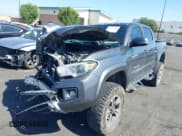 ✅ 2018 Toyota Tacoma TRD Sport • VIN: 3TMAZ5CN7JM066896 • Lot: 43401548. Listed on IAAI with 138,800 mi. Free auction sales archive from the USA and detailed vehicle history report at DreamBid. Image 2.