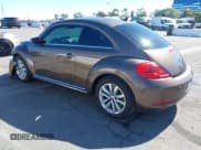 ✅ 2014 Volkswagen Beetle 2.0L TDI w/Sun/Sound/Nav • VIN: 3VWJL7AT1EM617082 • Лот: 43442124. Опубликован ранее на IAAI с пробегом 110 037 миль. Бесплатный доступ к архиву аукционных продаж из США и подробный отчёт об истории автомобиля на DreamBid. Изображение 3.
