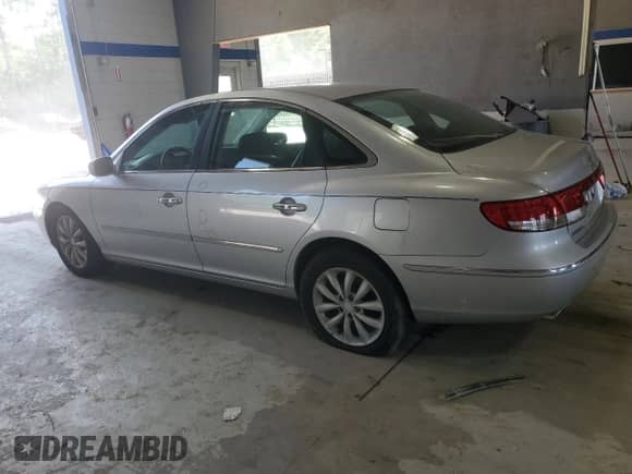2007 Hyundai Azera SE с VIN KMHFC46FX7A175179, выставлен на аукционе Copart как лот 61747625 с пробегом 193 663 миль миль и Списание • Salvage title. История ставок и продаж доступна на DreamBid. Изображение 2.