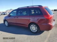 ✅ 2010 Toyota Sienna XLE • VIN: 5TDYK4CC0AS323487 • Lot: 82610125. Listed on Copart with 124,003 mi. Free auction sales archive from the USA and detailed vehicle history report at DreamBid. Image 2.