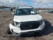 ✅ 2022 Honda Ridgeline RTL-E • VIN: 5FPYK3F70NB002186 • Lot: 43151037. Listed on IAAI with 106,821 mi. Free auction sales archive from the USA and detailed vehicle history report at DreamBid. Image 12.