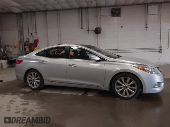 ✅ 2012 Hyundai Azera • VIN: KMHFH4JG1CA153065 • Lot: 43385837. Listed on IAAI with 97,920 mi. Free auction sales archive from the USA and detailed vehicle history report at DreamBid. Image 13.