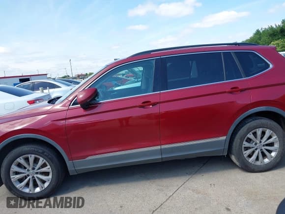✅ 2018 Volkswagen Tiguan SEL • VIN: 3VV3B7AX4JM027472 • Lot: 42398665. Listed on IAAI with 153,742 mi. Free auction sales archive from the USA and detailed vehicle history report at DreamBid. Image 14.