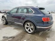 ✅ 2019 Bentley Bentayga V8 • VIN: SJAAM2ZV9KC024691 • Lot: 59217965. Listed on Copart with 33,243 mi. Free auction sales archive from the USA and detailed vehicle history report at DreamBid. Image 2.