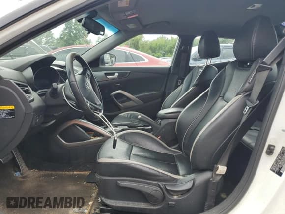 ✅ 2015 Hyundai Veloster Turbo • VIN: KMHTC6AE9FU229842 • Lot: 70097655. Wystawiony na Copart z przebiegiem 102 001 mil. Bezpłatny archiwum sprzedaży aukcyjnych z USA i szczegółowy raport historii pojazdu na DreamBid. Zdjęcie 7.