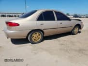 ✅ 1999 Ford Escort LX • VIN: 1FAFP10PXXW244941 • Lot: 66805705. Listed on Copart with 1,344,002 mi. Free auction sales archive from the USA and detailed vehicle history report at DreamBid. Image 3.