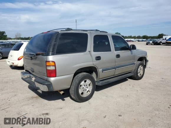 2002 Chevrolet Tahoe LT с VIN 1GNEC13Z52J169562, выставлен на аукционе Copart как лот 81831655 с пробегом Не указан миль и Списание • Salvage title. История ставок и продаж доступна на DreamBid. Изображение 3.