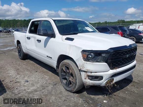 ✅ 2023 Ram 1500 Lone Star • VIN: 1C6SRFMT5PN599519 • Lot: 42921193. Listed on IAAI with 153,168 mi. Free auction sales archive from the USA and detailed vehicle history report at DreamBid. Image 1.