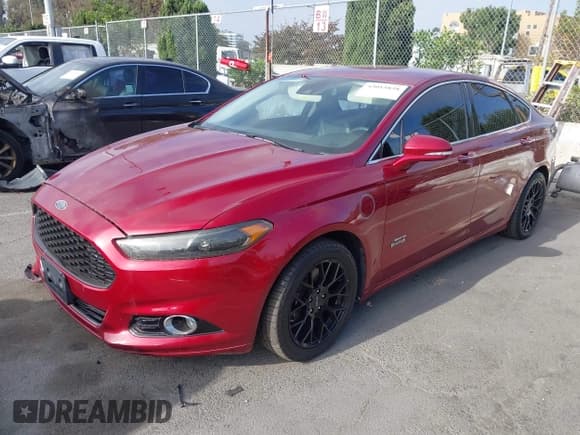 ✅ 2014 Ford Fusion Titanium • VIN: 3FA6P0SU4ER111654 • Лот: 43015858. Опубликован ранее на IAAI с пробегом 140 806 миль. Бесплатный доступ к архиву аукционных продаж из США и подробный отчёт об истории автомобиля на DreamBid. Изображение 17.