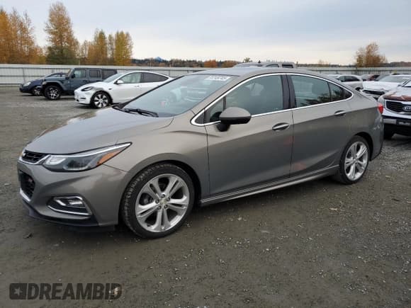 ✅ 2017 Chevrolet Cruze Premier • VIN: 1G1BF5SM9H7206904 • Лот: 91249745. Опубликован ранее на Copart с пробегом 64 345 миль. Бесплатный доступ к архиву аукционных продаж из США и подробный отчёт об истории автомобиля на DreamBid. Изображение 1.