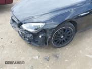 ✅ 2015 BMW 6 Series 640i xDrive • VIN: WBA6B8C56FD453614 • Lot: 42534852. Wystawiony na IAAI z przebiegiem 129 174 mil. Bezpłatny archiwum sprzedaży aukcyjnych z USA i szczegółowy raport historii pojazdu na DreamBid. Zdjęcie 18.