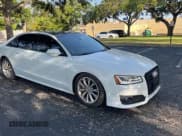 ✅ 2017 Audi A8 Sport • VIN: WAU43AFD7HN005619 • Lot: 57526015. Listed on Copart with 57,262 mi. Free auction sales archive from the USA and detailed vehicle history report at DreamBid. Image 1.