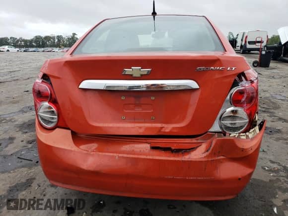 2012 Chevrolet Sonic LT z VIN 1G1JC5SH3C4171861, wystawiony jako Copart lot #71653174 z przebiegiem 169 648 mil mil oraz Szkoda całkowita • Salvage title. Historia ofert i sprzedaży dostępna na DreamBid. Obrazek 6.