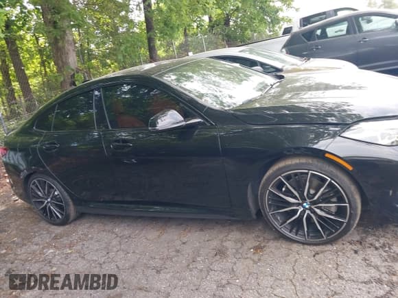 ✅ 2022 BMW 2 Series 228i • VIN: WBA53AK03N7K53082 • Lot: 42141257. Wystawiony na IAAI z przebiegiem 40 553 mil. Bezpłatny archiwum sprzedaży aukcyjnych z USA i szczegółowy raport historii pojazdu na DreamBid. Zdjęcie 13.