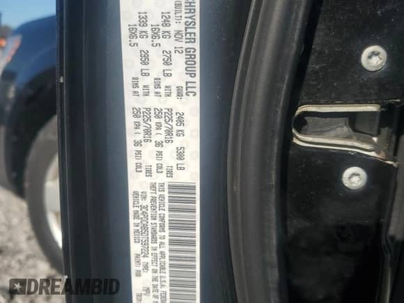 2013 Dodge Journey American Value with VIN 3C4PDCAB5DT597224, listed as a Copart auction lot 82536665 with 104,666 mi miles and Clean title. Bid and sale history available at DreamBid. Image 13.