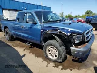 2002 Dodge Dakota Sport z VIN 1B7GG32NX2S616395, wystawiony jako Copart lot #70294944 z przebiegiem 205 067 mil mil oraz Czysty tytuł • Clean title. Historia ofert i sprzedaży dostępna na DreamBid. Obrazek 4.