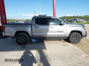 ✅ 2020 Toyota Tacoma SR5 • VIN: 3TMAZ5CN4LM128094 • Lot: 42818941. Listed on IAAI with 67,866 mi. Free auction sales archive from the USA and detailed vehicle history report at DreamBid. Image 13.